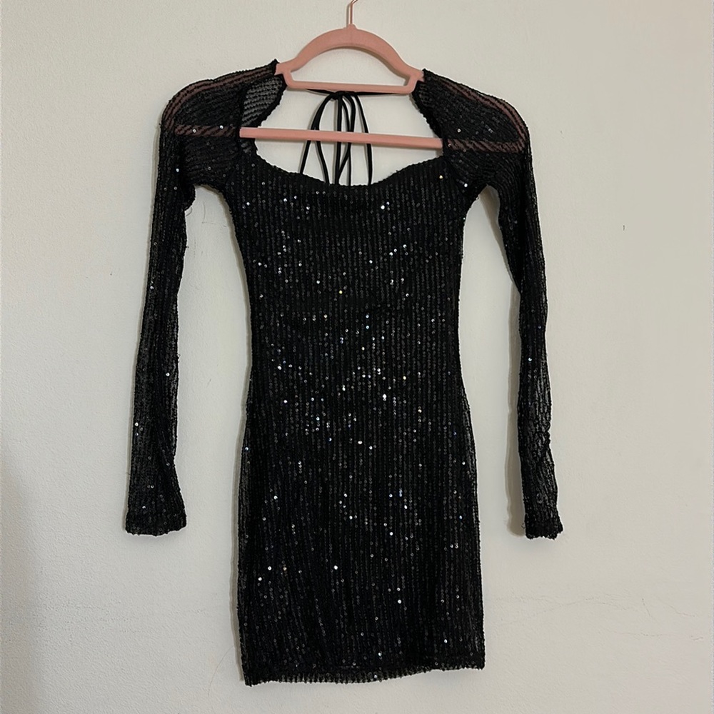 Lucy in the sky dress, woman’s xs. Bought for homecoming but did not fit.